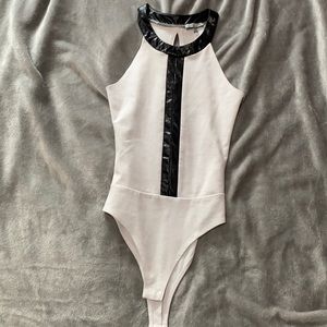White and black bodysuit